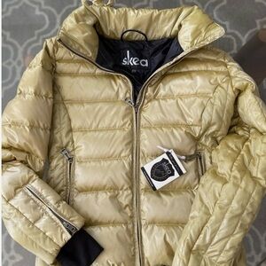 Skea ski jacket size 4 iridescent, gold/champagne, women’s excellent condition💛